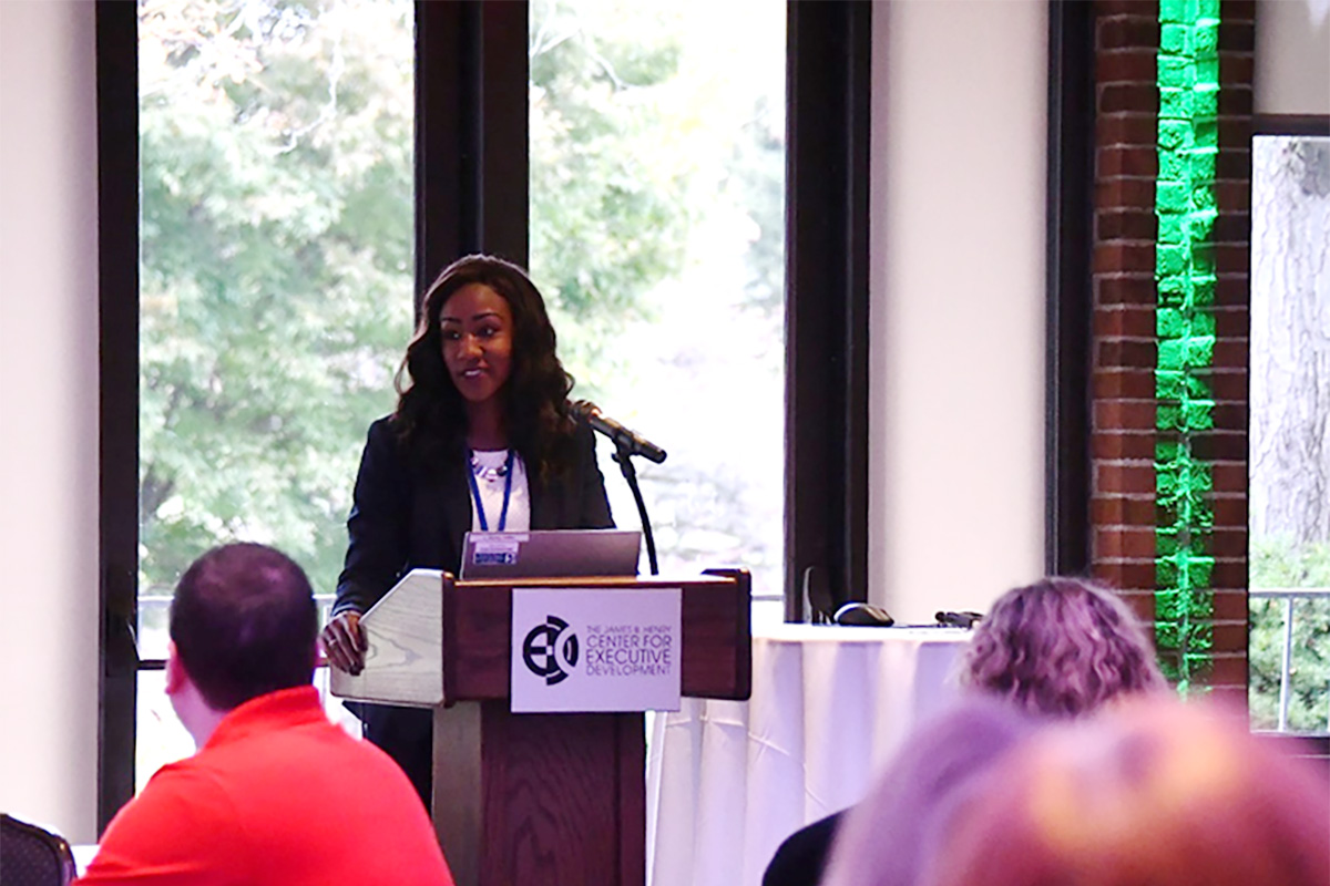 Dr. Travis speaking at the University Club